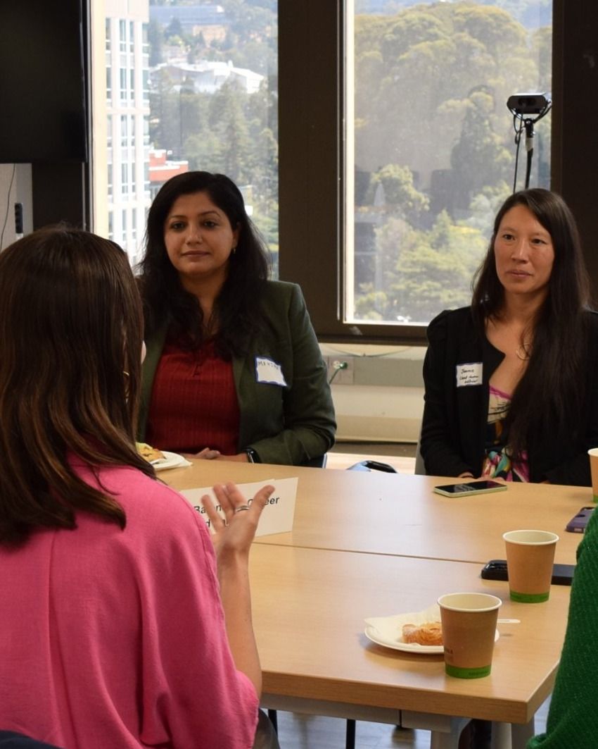 Jennie listening during a roundtable conversation with a group of women leaders